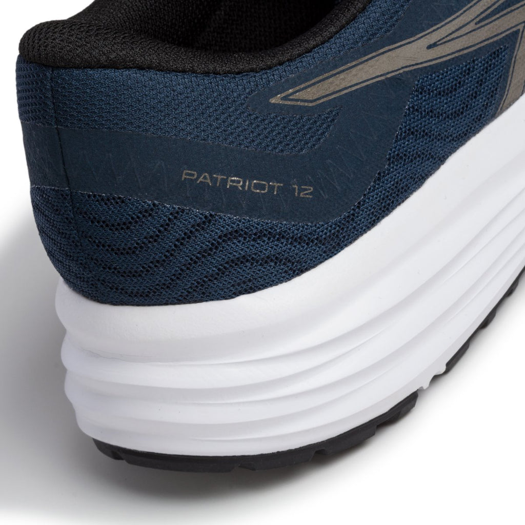 Scarpe da running blu con strisce laterali a contrasto Asics Patriot 12