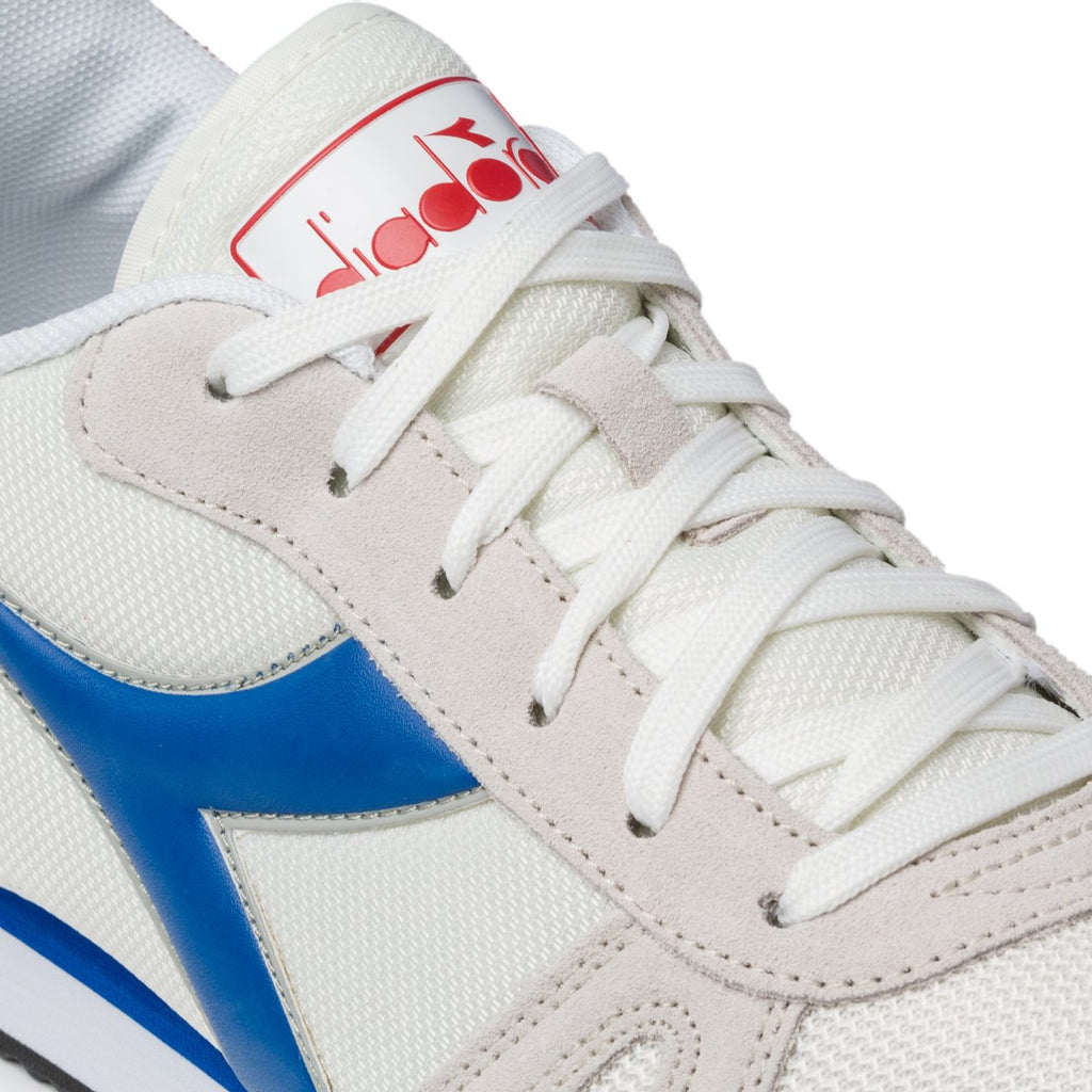 Scarpe da running bianche con logo a contrasto Diadora Simple Run