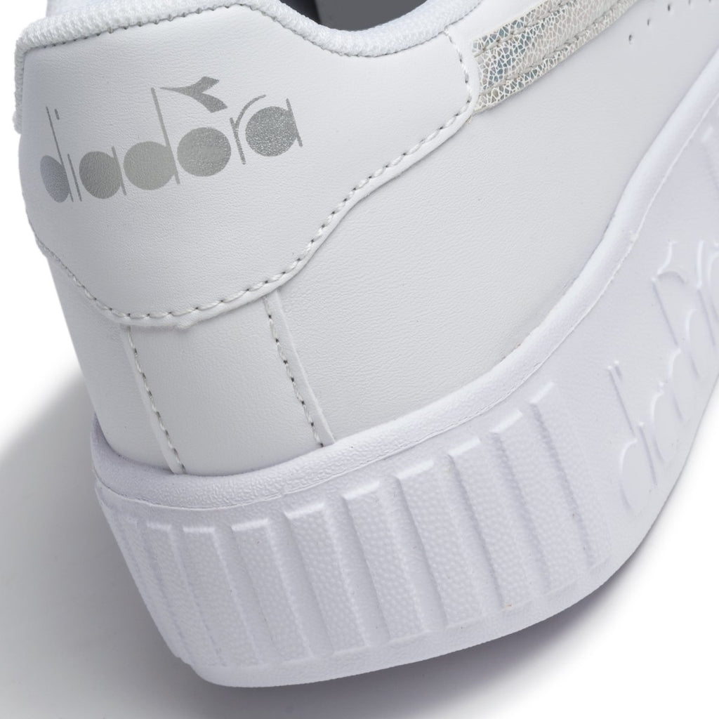 Sneakers bianche con logo argento effetto laminato Diadora Game Step Gs